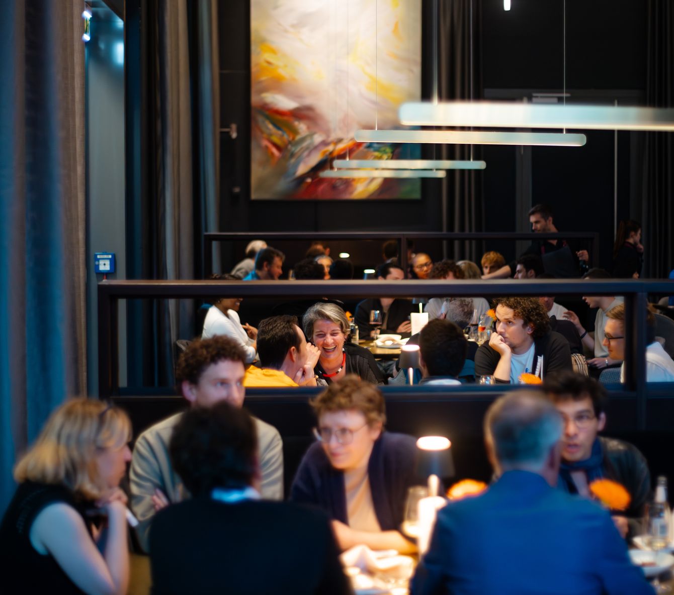 Funders in conversation over dinner at a Funding the Commons gathering