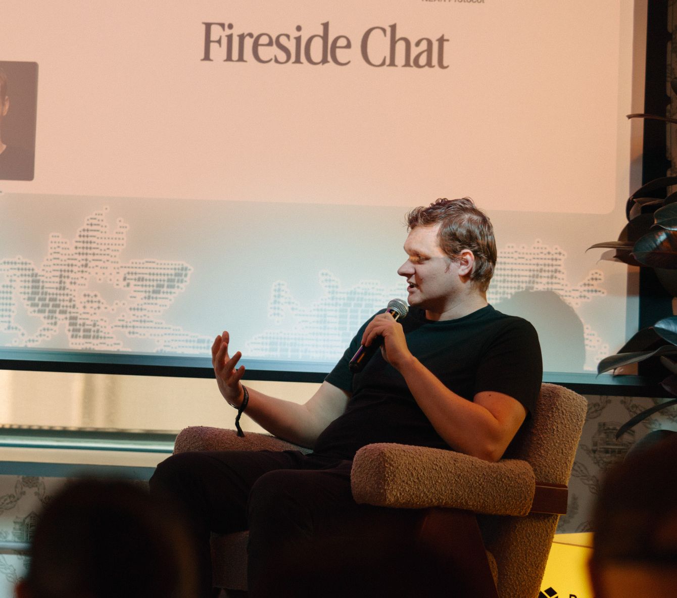 A fireside chat on stage at Funding the Commons San Francisco