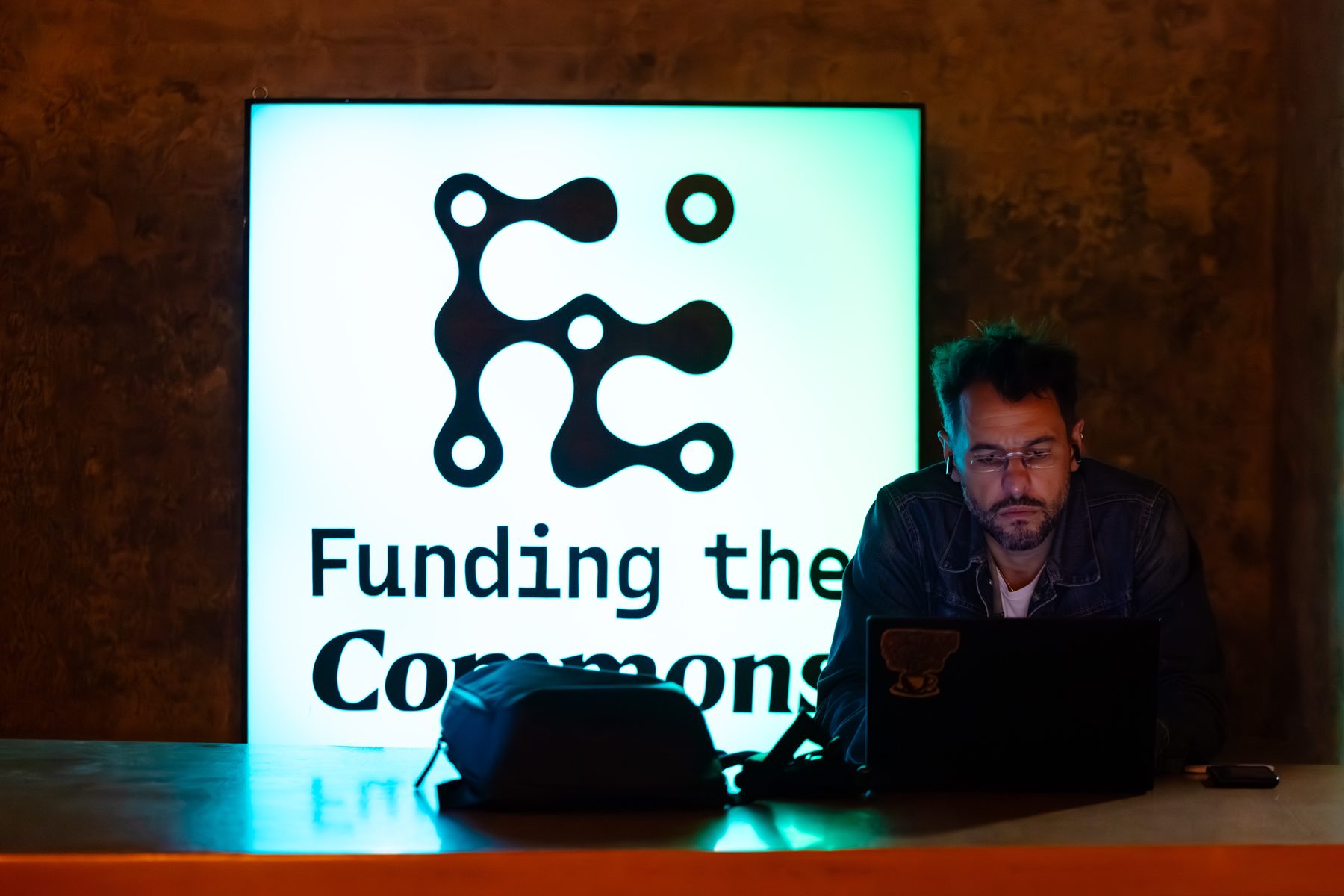 The Funding the Commons mark on screen at the Berlin Forum 2025