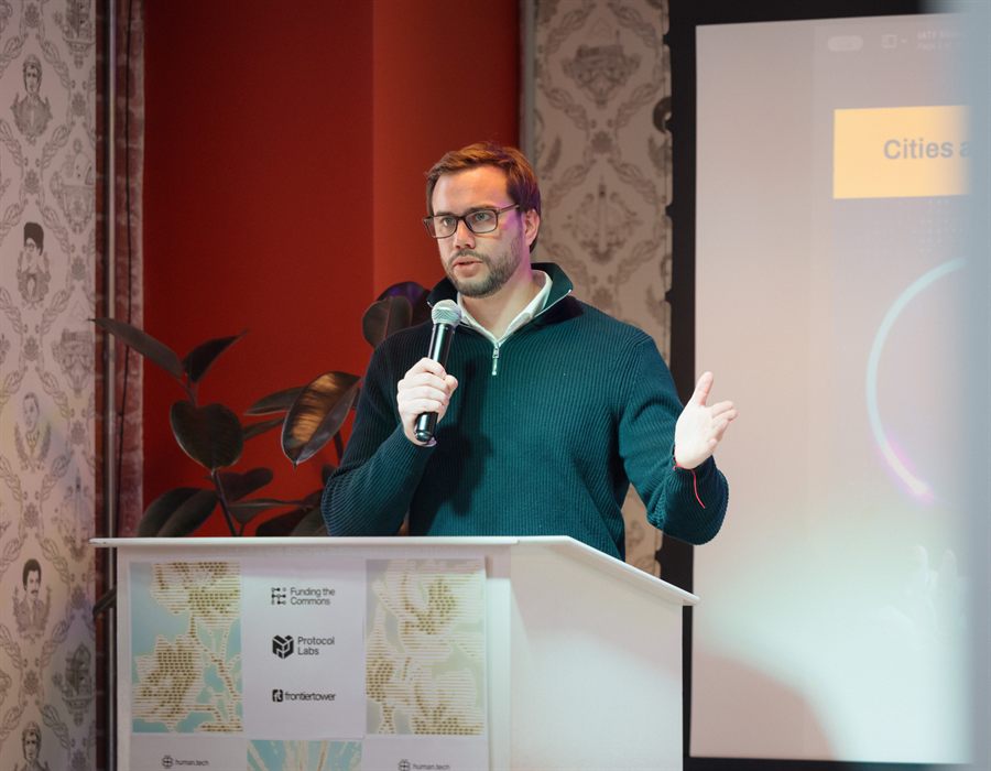 A Funding the Commons speaker addressing an institutional audience